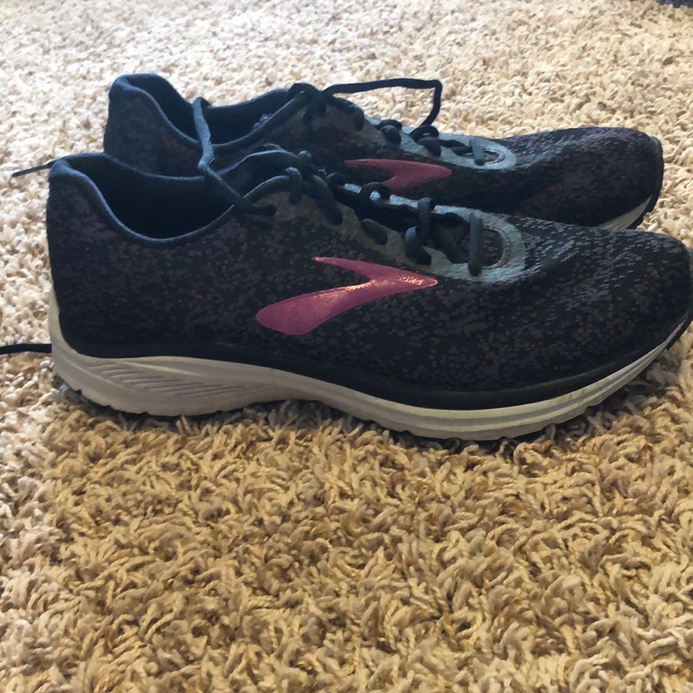 Black and pink brooks running shoes